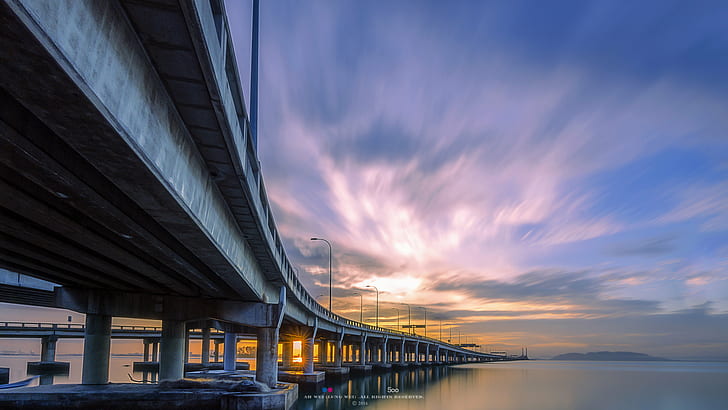 photograph of gray wooden bridge under blue sky, penang bridge, penang bridge