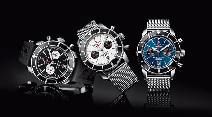 three assorted-color smartwatches, Breitling, superocean heritage chronographe 44