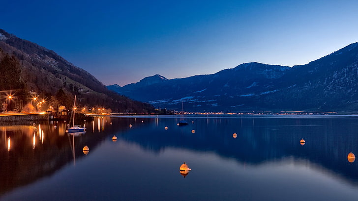 white water buoys, mountains, lake zug (switzerland), night, boat
