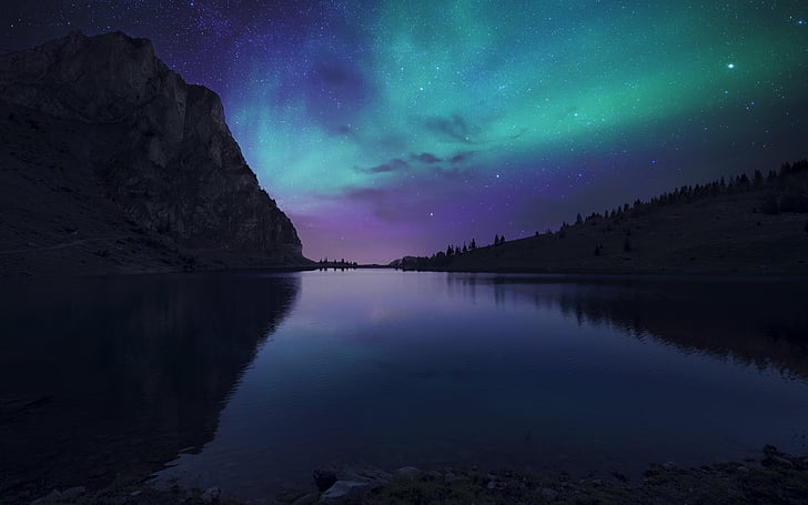 large body of water beside mountain during nighttime, Aurora sky