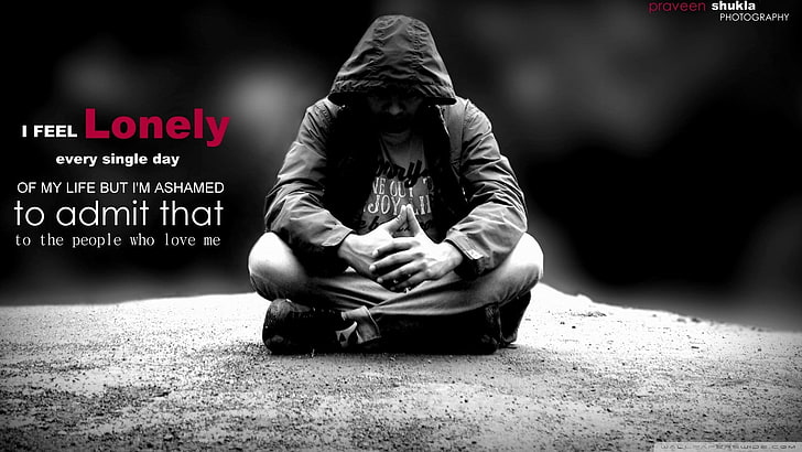 black hoodie, text, men, selective coloring, one person, sitting