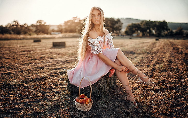women, blonde, pink dress, field, sitting, bare shoulders, Evgeny Freyer
