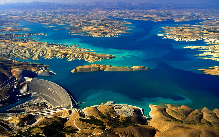 aerial view of mountains surrounding water and dam, lake, Turkey