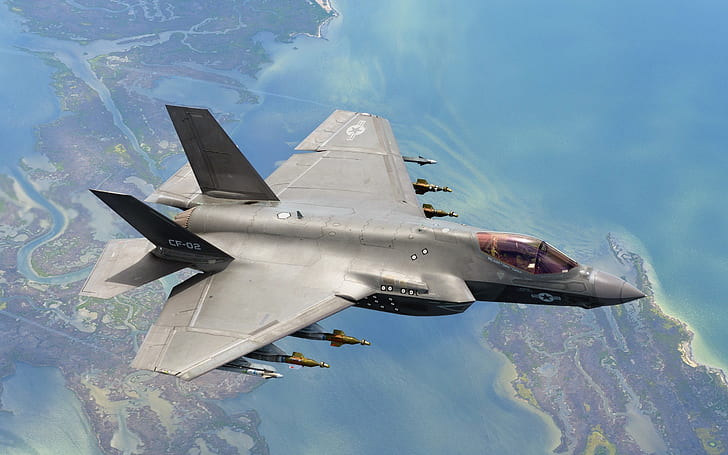 F-35C aircraft flight, weapons, gray jet