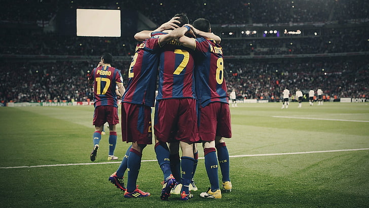 group of soccer playing having a group hug, FC Barcelona, group of people