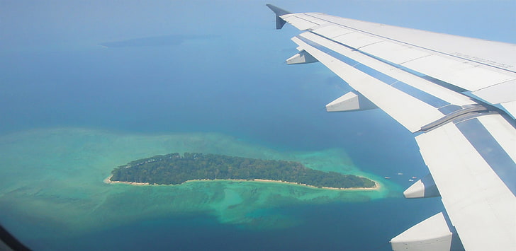 aerial photography of an island, sea, water, airplane, nature