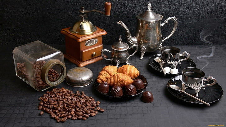Coffee, stainless steel tea set, coffee grinder, and coffee beans