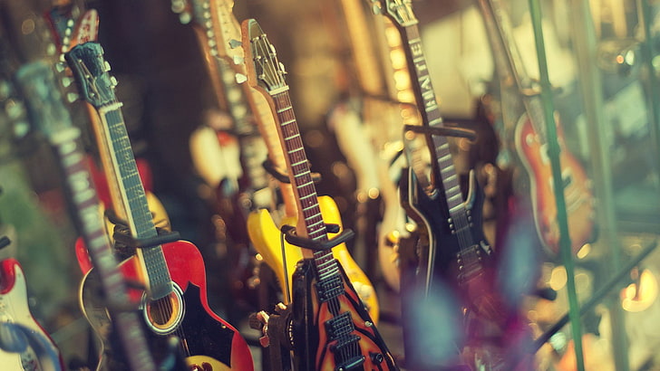 assorted-colored guitar lot, music, shop, electric guitar, selective focus