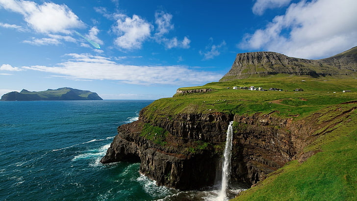 photograph of waterfalls rushing onto sea, landscape, cliff, scenics - nature