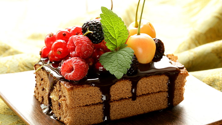 slices of cake with fruit toppings, chocolate, food, raspberries