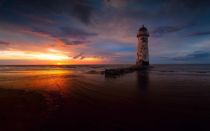 landscape photography of lighthouse during sunset, beach, sea
