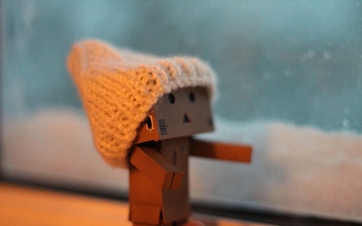 white cable knit cap, danboard, cardboard robot, paper, hat, house