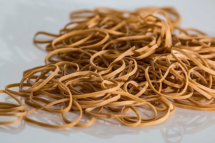 elastic bands, office supplies, pile, rubber bands, stationery