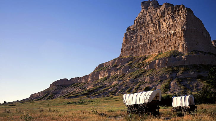 Wagons In Eagle Rock Monument Nebraska, cliff, meadow, nature and landscapes, HD wallpaper