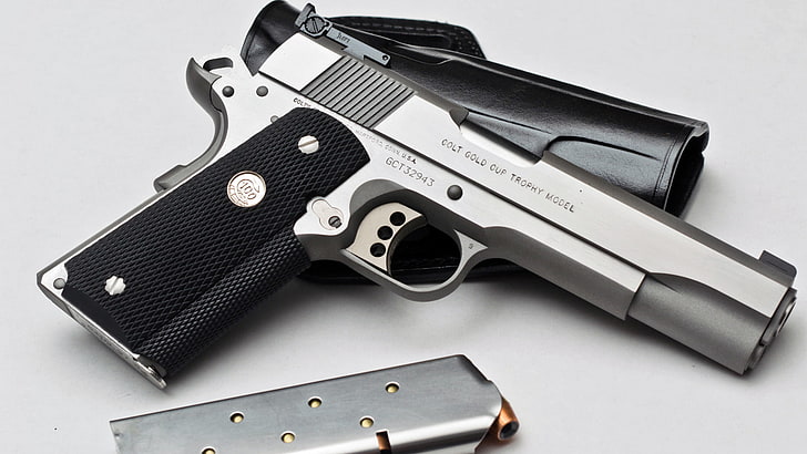 gray and black semi-automatic pistol, gun, holster, model, clip