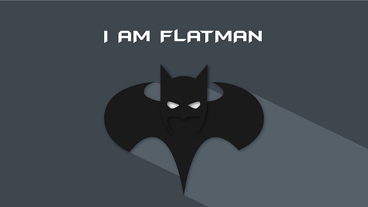 Batman logo with text overlay, one animal, no people, domestic cat