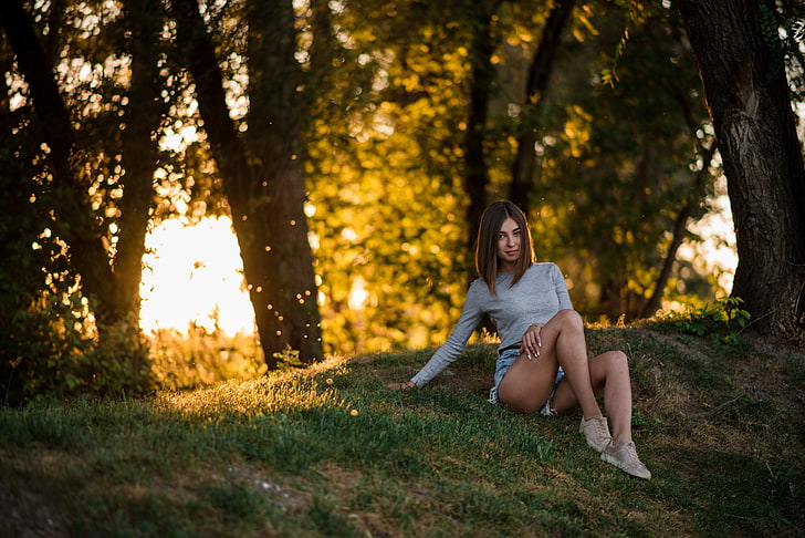 women, sitting, grass, trees, jean shorts, sneakers, smiling, HD wallpaper
