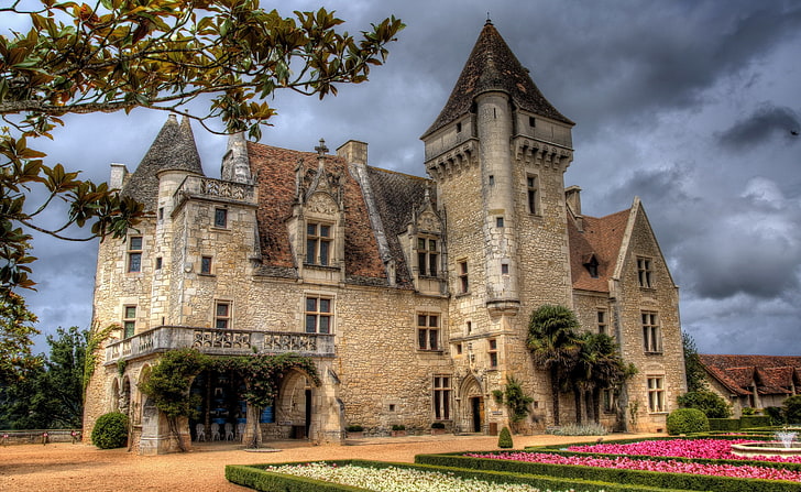 Chateau Des Milandes Castle, Dordogne, France, brown concrete mansion