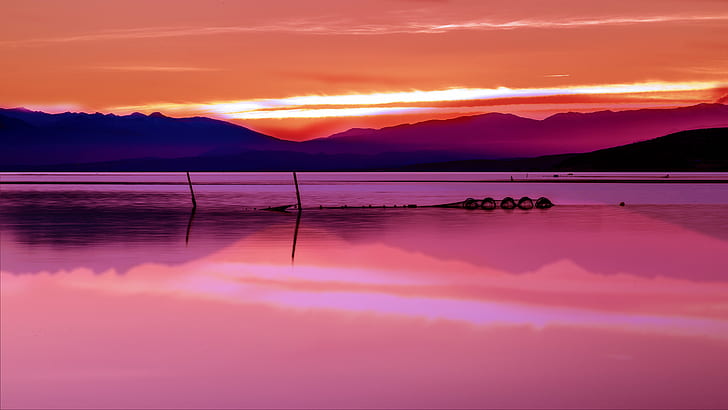 silhouette of mountains surrounded with water during sunrise, leucate, leucate