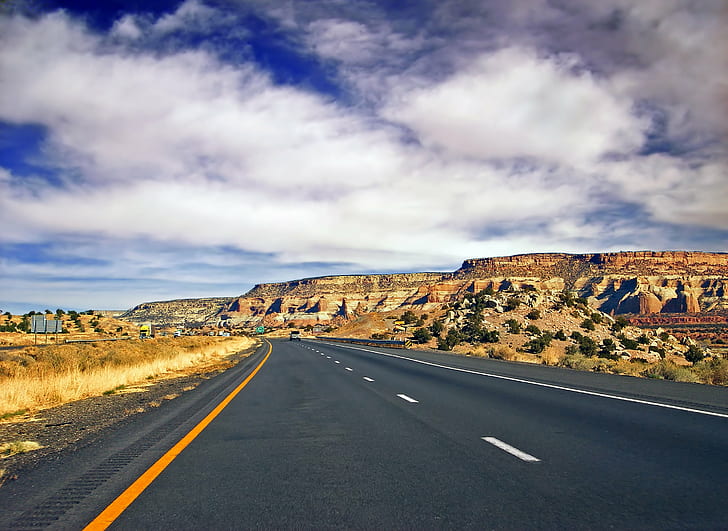 close up photo of gray road between brown valleys under blue sky, HD wallpaper
