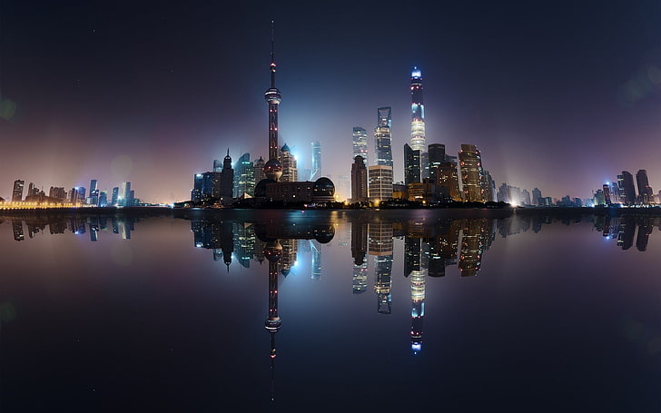 cityscape of high-rise buildings, city skyline photography at nighttime