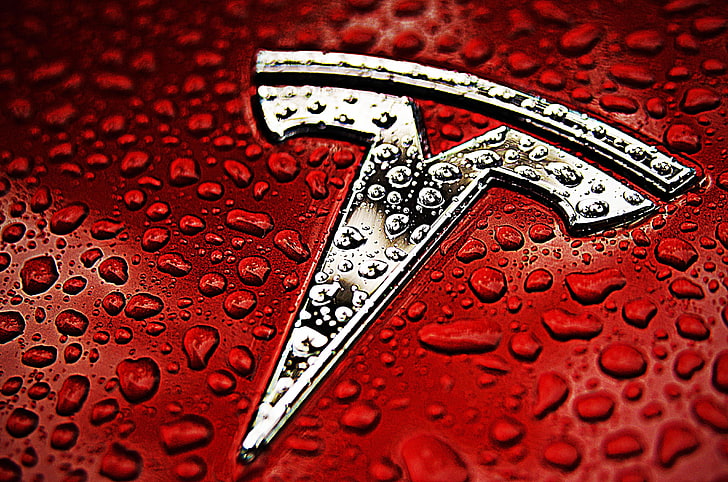Tesla Motors, logo, red, close-up, luck, no people, indoors