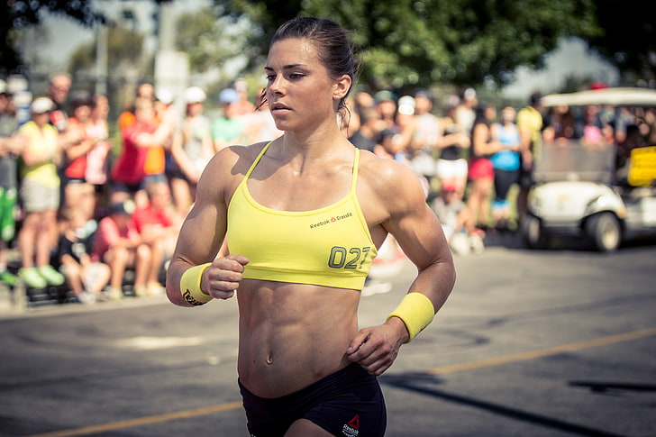 women's yellow sports bra, strength, athlete, muscle mass, Julie Foucher
