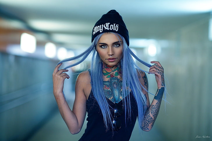 women's black and white knit hat, long hair, blue hair, nose rings