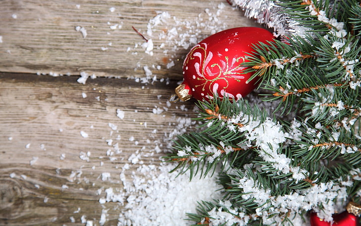 red bauble, New Year, snow, Christmas ornaments , leaves, wooden surface