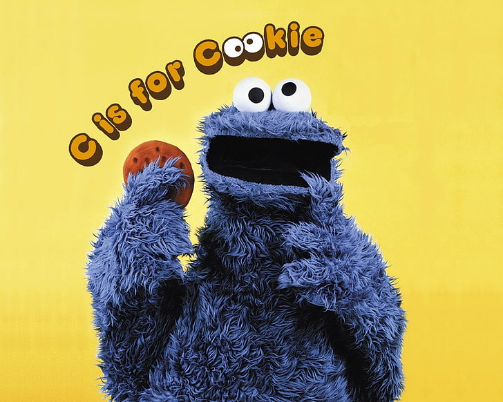 Cookie Monster with text overlay, Sesame Street, yellow, representation