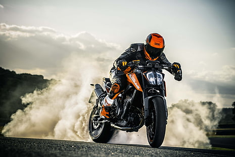 HD wallpaper: man riding on orange and black sports bike under white sky  during daytime | Wallpaper Flare
