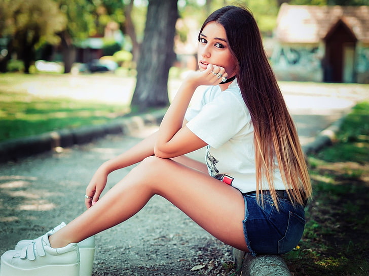 woman wearing short shorts sitting on stone, Adriano Perticone, HD wallpaper