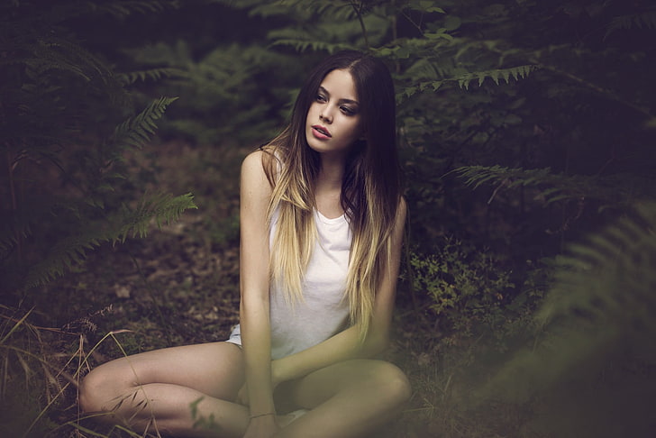 woman in white tank top sitting in a forest, women, dyed hair