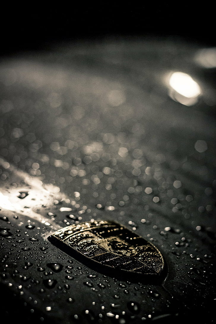 focus photo of Porsche logo, München, Munich, Street, Night