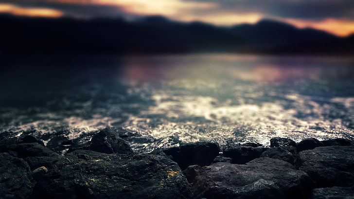 black rocks, closeup photo of rocks near body of water at dusk, HD wallpaper