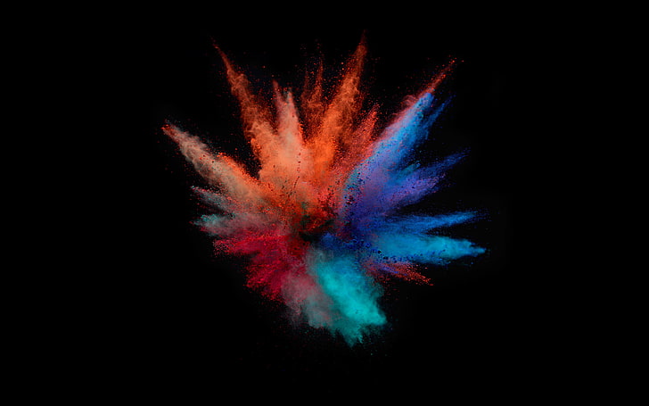 MacBook Pro Color Splash, exploding, black background, studio shot