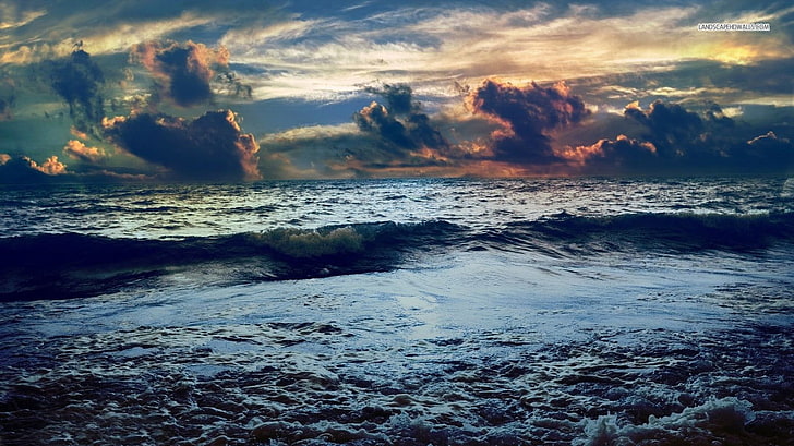 landscape photo of sea waves under cloudy sky during daytime