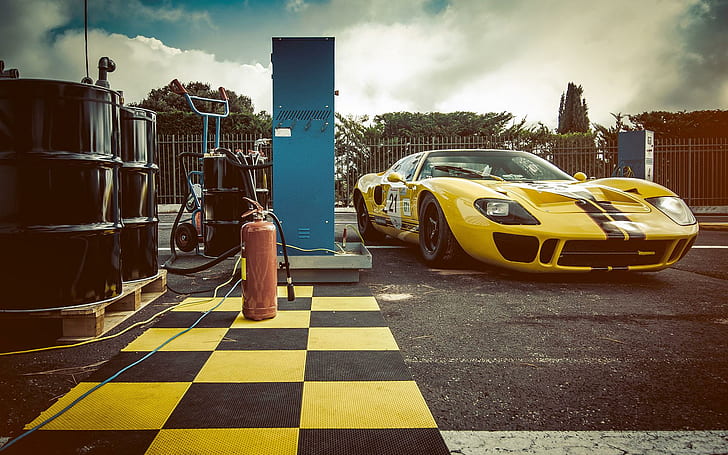 Ford GT40 vintage version, yellow and black sports coupe, car
