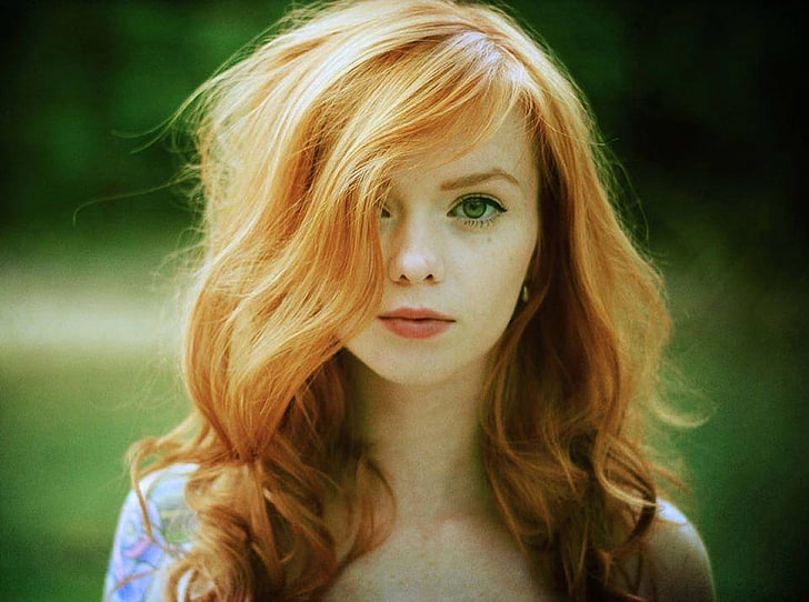 Redhead Girl With Green Eyes