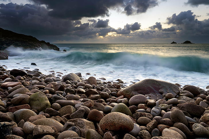 seashore stones near body of water during daytime, Incoming, sky