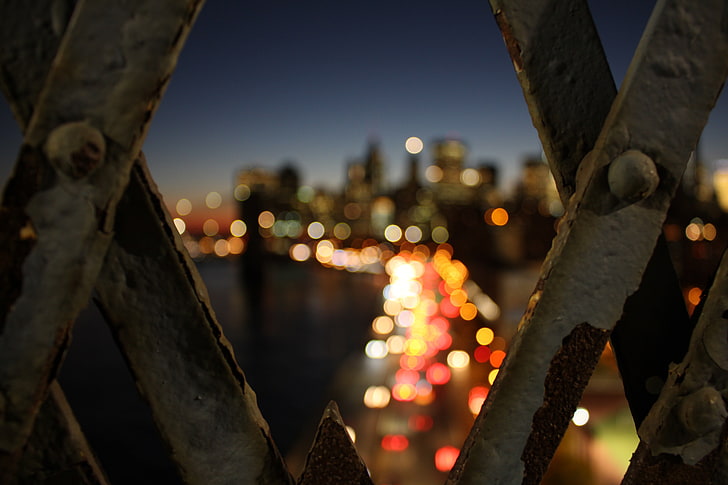 white metal frame, New York City, bridge, night, blurred, illuminated