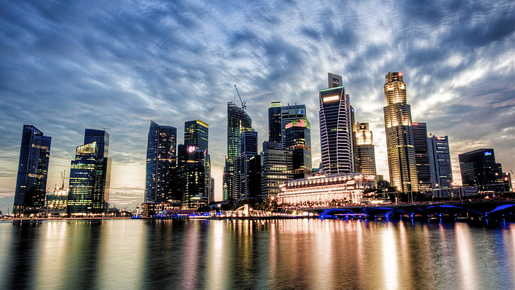 Singapore, city view, sunset, skyscrapers, clouds, river, water reflection