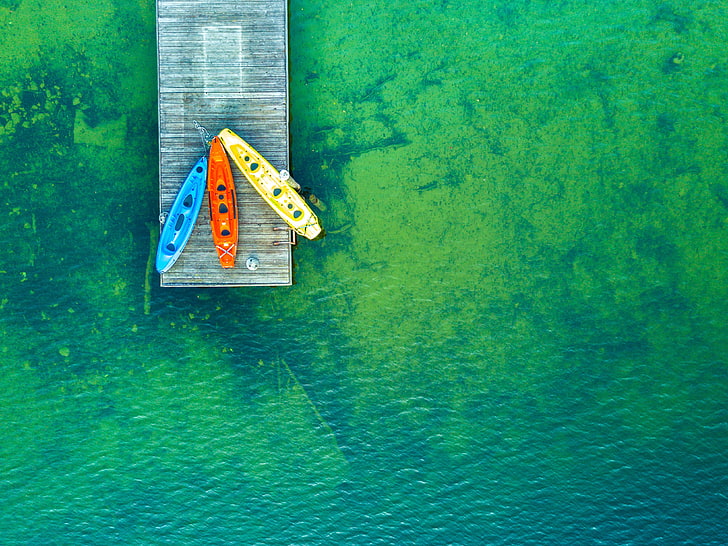 photo of three kayaks on dock, green, water, pier, nature, drone photo