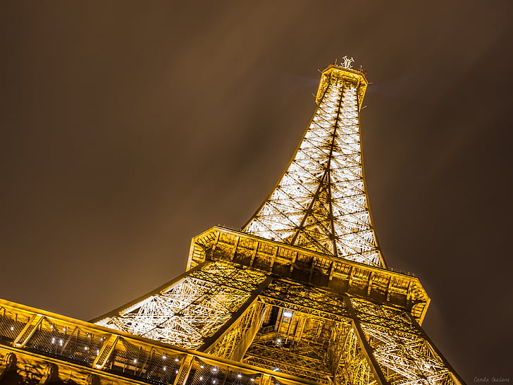 Eiffel tower lit during nighttime, Champ de Mars, Paris, HD