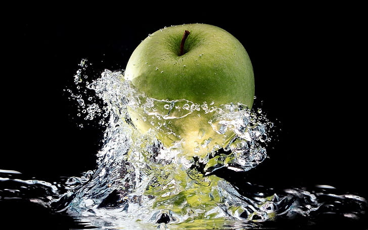 Green apple in a splash of fresh water, green apple, photography