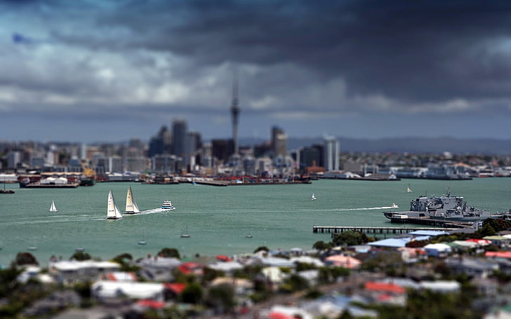 white sail boat, tilt shift, river, cityscape, clouds, Auckland