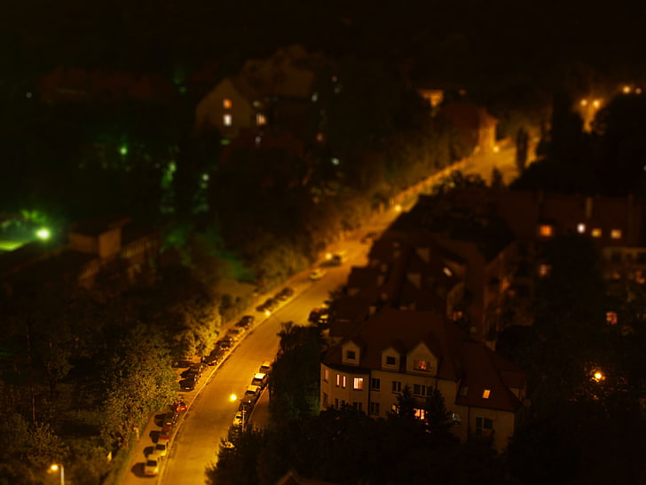 tilt-shift photography of houses, high angle view of cars on road