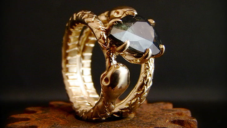 ouroboros, jewelry, gold colored, close-up, indoors, diamond - gemstone