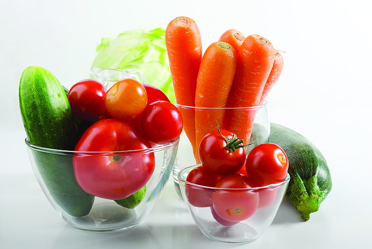 assorted vegetables on glasses, salad bowl, tomato, carrot, cucumber
