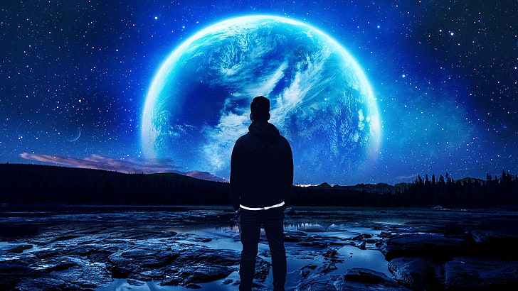 man standing facing the field during night, space, planet, rear view
